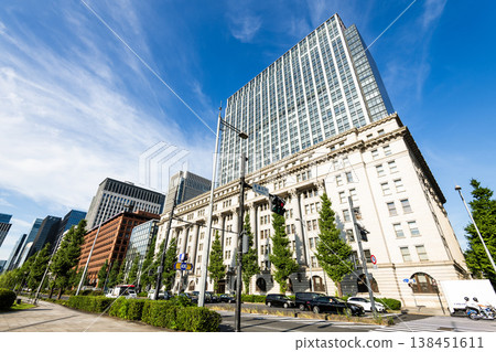 Building view of the Meiji Seimei Kan in Marunouchi, Tokyo, Japan, is in the Greek Revival architectural style. It has been designated as a National Cultural Property. Building view of the Meiji Seimei Kan in Marunouchi, Tokyo, Japan, is in the Greek Revival architectural style. It has been designated as a National Cultural Property. 138451611