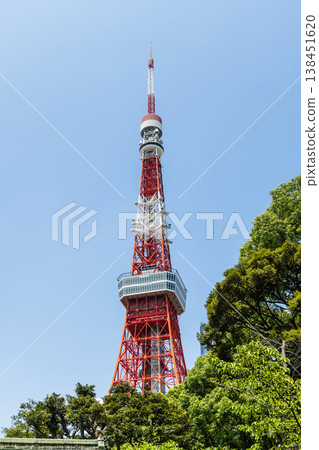 Low-angle view of the Tokyo Tower in Minato, Tokyo, Japan. It is a lattice tower inspired by the Eiffel Tower. In Japan, the second-tallest tower is after Tokyo Skytree. 138451620