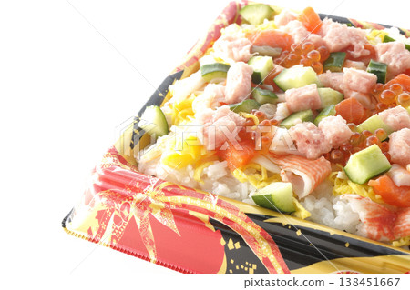 A photo of a generously topped chirashi sushi against a white background. A photo of a generously topped chirashi sushi against a white background. 138451667