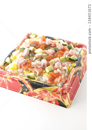A photo of a generously topped chirashi sushi against a white background. A photo of a generously topped chirashi sushi against a white background. 138451673