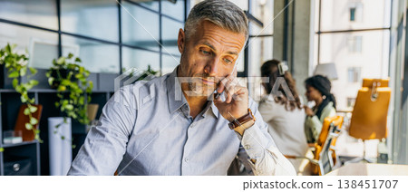 Professional manager engaging with city view background Professional manager engaging with city view background 138451707