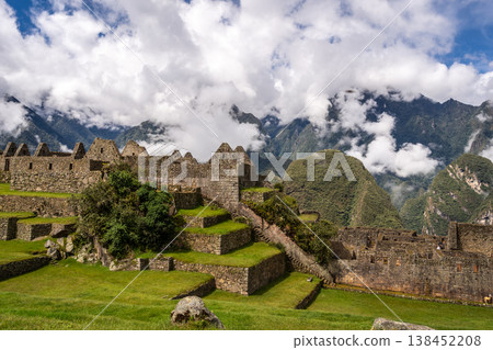 Panoramic view of Machu Picchu ruins with Huayna Picchu in background, Peru Panoramic view of Machu Picchu ruins with Huayna Picchu in background, Peru 138452208