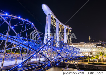 Night view of The Helix Bridge and the Marina Bay Sands Resort, Singapore, it's a pedestrian bridge linking the Marina Centre with Marina South. 138452274