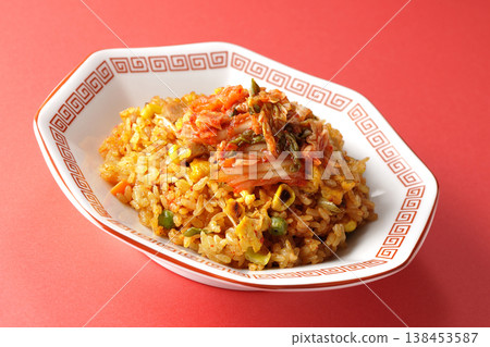 A single serving of spicy kimchi fried rice. A single serving of spicy kimchi fried rice. 138453587