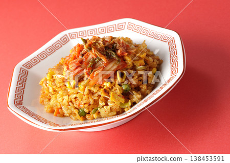 A single serving of spicy kimchi fried rice. A single serving of spicy kimchi fried rice. 138453591