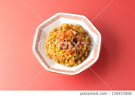 A single serving of spicy kimchi fried rice. 138453606