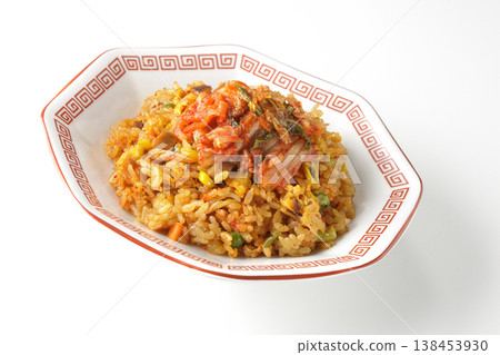 Spicy kimchi fried rice photographed alone against a white background. 138453930