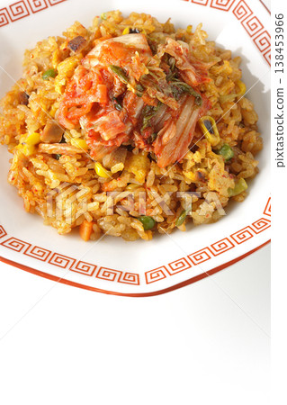 Spicy kimchi fried rice photographed alone against a white background. 138453966
