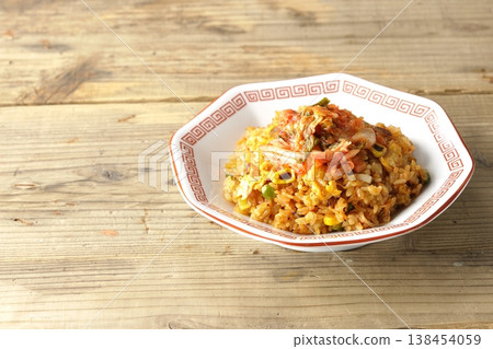 A single serving of spicy kimchi fried rice. 138454059