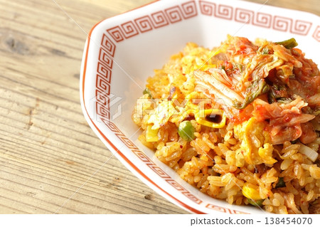 A single serving of spicy kimchi fried rice. 138454070