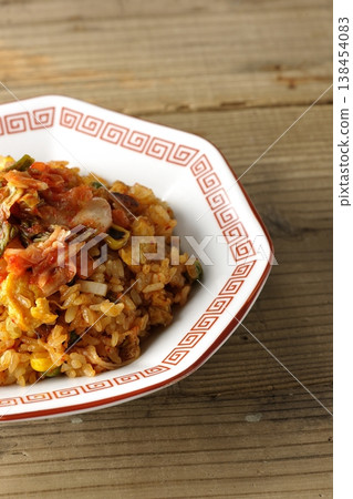 A single serving of spicy kimchi fried rice. A single serving of spicy kimchi fried rice. 138454083