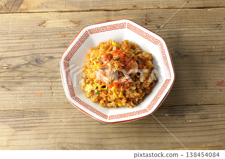 A single serving of spicy kimchi fried rice. 138454084