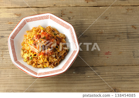 A single serving of spicy kimchi fried rice. A single serving of spicy kimchi fried rice. 138454085