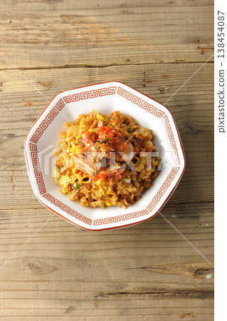A single serving of spicy kimchi fried rice. A single serving of spicy kimchi fried rice. 138454087