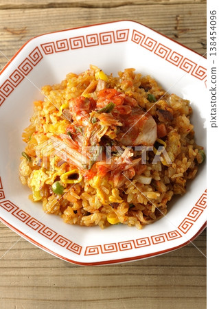 A single serving of spicy kimchi fried rice. 138454096