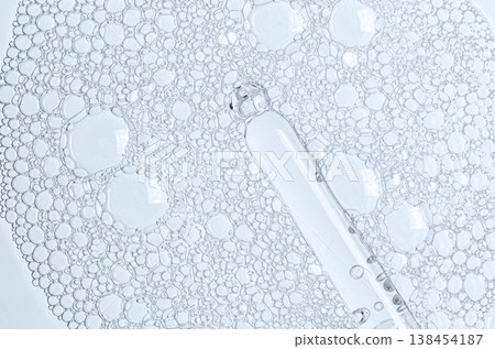 The texture of the foam of shower gel or soap suds or shaving foam. Macrophotography The texture of the foam of shower gel or soap suds or shaving foam. Macrophotography 138454187