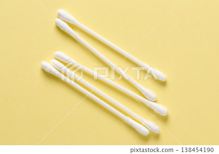 Cotton swabs for hygiene. Yellow background. Cotton swabs for hygiene. Yellow background. 138454190