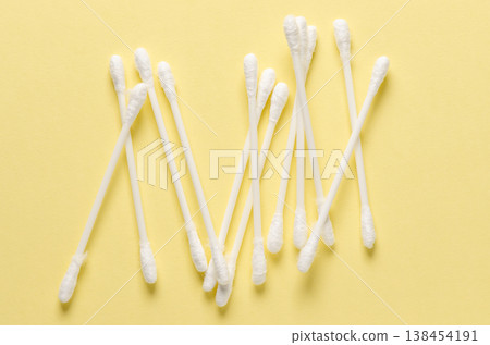 Cotton swabs for hygiene. Yellow background. Cotton swabs for hygiene. Yellow background. 138454191