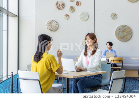 Woman working in the office 138454304