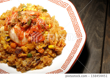 A single serving of spicy kimchi fried rice. 138454451