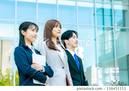 Businesswoman standing with a laptop Businesswoman standing with a laptop 138455151