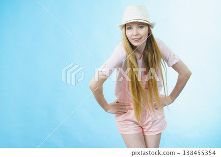 Happy woman wearing summer outfit Happy woman wearing summer outfit 138455354