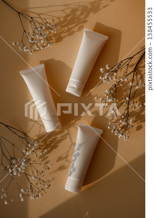A white empty tube for cream, paste, gel, or shampoo as a mockup. An empty cosmetic tube A white empty tube for cream, paste, gel, or shampoo as a mockup. An empty cosmetic tube 138455533
