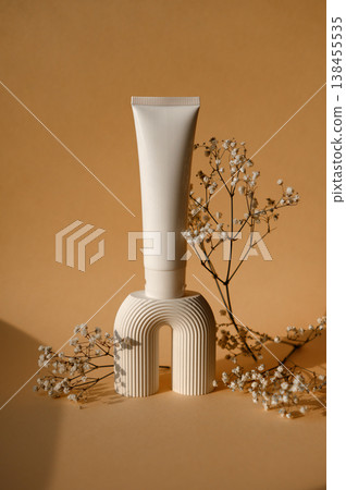 A white empty tube for cream, paste, gel, or shampoo as a mockup. An empty cosmetic tube A white empty tube for cream, paste, gel, or shampoo as a mockup. An empty cosmetic tube 138455535