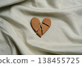 Broken heart on textile. divorce concept. 138455725