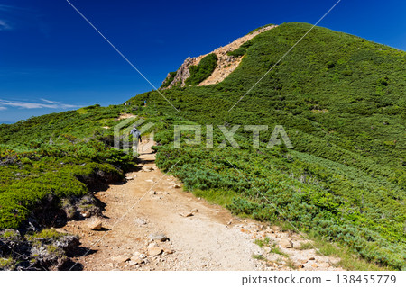The Yatsugatake mountain range and Nishitengudake as seen from the saddle between Higashitengudake and Nishitengudake. The Yatsugatake mountain range and Nishitengudake as seen from the saddle between Higashitengudake and Nishitengudake. 138455779