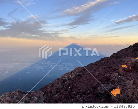 The mystical shadow of Mount Fuji encountered at the summit of the Pyramid in the Sky. 138455920