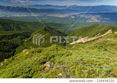 View of the Central Alps, including Mount Ontake and Mount Norikura, from Mount Nishitengu in the Yatsugatake mountain range. View of the Central Alps, including Mount Ontake and Mount Norikura, from Mount Nishitengu in the Yatsugatake mountain range. 138456210
