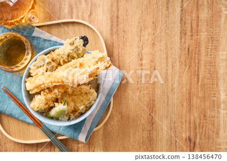 Tendon: A rice bowl topped with tempura shrimp and vegetables. 138456470