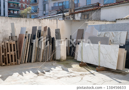 Stone slabs and marble panels storage in construction yard urban building material industry workshop 138456633