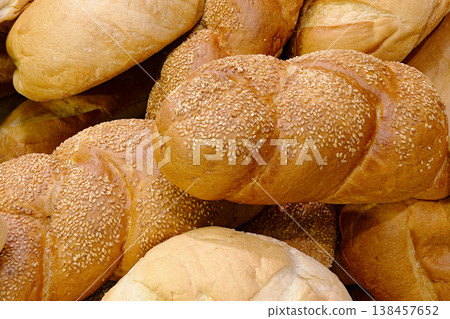 Various types of white wheat bread - loaves, baguettes, buns, rolls Various types of white wheat bread - loaves, baguettes, buns, rolls 138457652