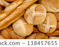 Various types of white wheat bread - loaves, baguettes, buns, rolls 138457655