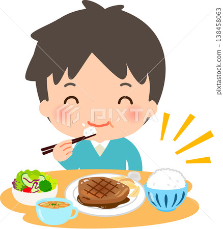 A young man eating Western food with meat as the main dish. A young man eating Western food with meat as the main dish. 138458063