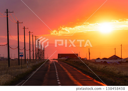 A poignant scene of the Notsuke-Furen Park Line on the Notsuke Peninsula in Hokkaido at dusk as the sun sets. 138458438