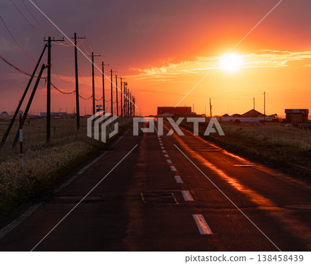 A poignant scene of the Notsuke-Furen Park Line on the Notsuke Peninsula in Hokkaido at dusk as the sun sets. A poignant scene of the Notsuke-Furen Park Line on the Notsuke Peninsula in Hokkaido at dusk as the sun sets. 138458439