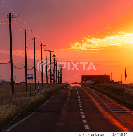 A poignant scene of the Notsuke-Furen Park Line on the Notsuke Peninsula in Hokkaido at dusk as the sun sets. A poignant scene of the Notsuke-Furen Park Line on the Notsuke Peninsula in Hokkaido at dusk as the sun sets. 138458441