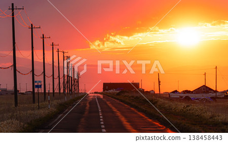 A poignant scene of the Notsuke-Furen Park Line on the Notsuke Peninsula in Hokkaido at dusk as the sun sets. A poignant scene of the Notsuke-Furen Park Line on the Notsuke Peninsula in Hokkaido at dusk as the sun sets. 138458443