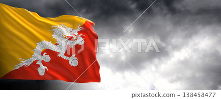 National flag of Bhutan with dark clouds, 3D rendering National flag of Bhutan with dark clouds, 3D rendering 138458477