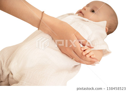 A mother tenderly holds her baby's tiny hand, isolated, PNG A mother tenderly holds her baby's tiny hand, isolated, PNG 138458523