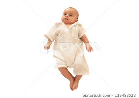Baby in cute outfit relaxes comfortably, isolated, PNG 138458528