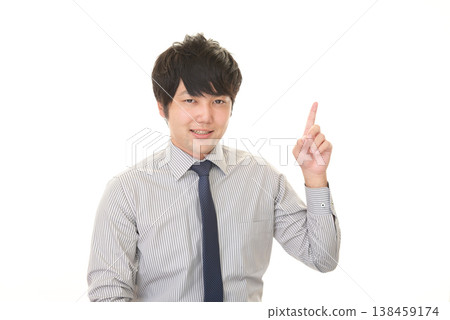 指示一個微笑的商人 138459174