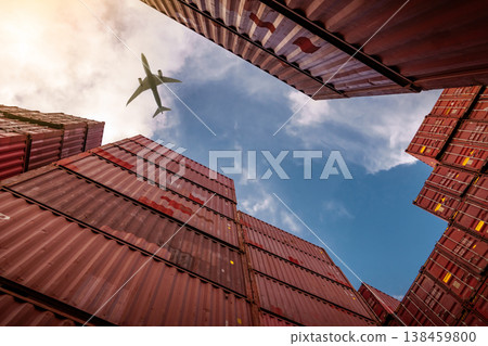 Airplane flying above container logistic. Cargo and shipping business. Container ship for import and export logistic. Logistic industry from port to port. Container at harbor for truck transport. Airplane flying above container logistic. Cargo and shipping business. Container ship for import and export logistic. Logistic industry from port to port. Container at harbor for truck transport. 138459800