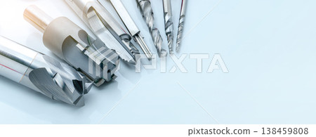 Special tools isolated on white background. Made to order special tools. Coated step drill and reamer detail. HSS cemented carbide. Carbide cutting tool for industrial applications. Engineering tools. 138459808