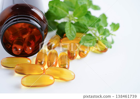 Alternative medicine herbal organic capsule with vitamin E omega 3 fish oil, mineral, drug with herbs leaf natural supplements for healthy good life. Alternative medicine herbal organic capsule with vitamin E omega 3 fish oil, mineral, drug with herbs leaf natural supplements for healthy good life. 138461739