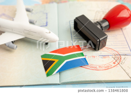 South Africa flag and passport with airplane for travel. South Africa flag and passport with airplane for travel. 138461808