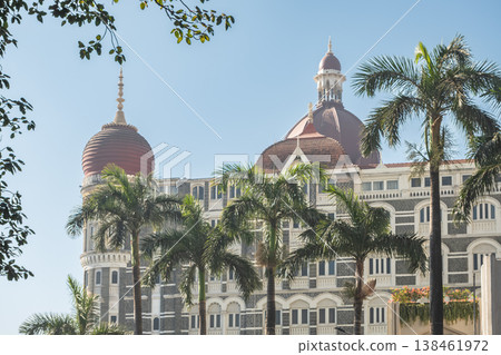 The Taj Mahal Palace luxury hotel on the seaside promenade Gateway of India with palm trees 138461972